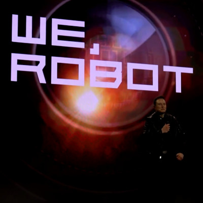 Screenshot from a Tesla video: Elon Musk presents "We, Robots" (Credit: Tesla).